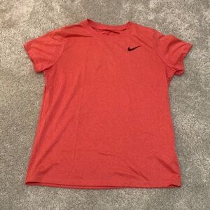 Red Nike athletic shirt